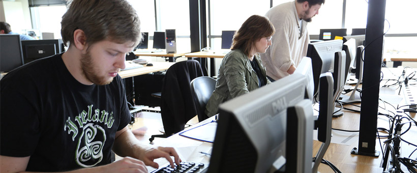 Students sitting at computer workstations